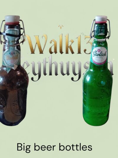 Grote lege Grolsch flessen